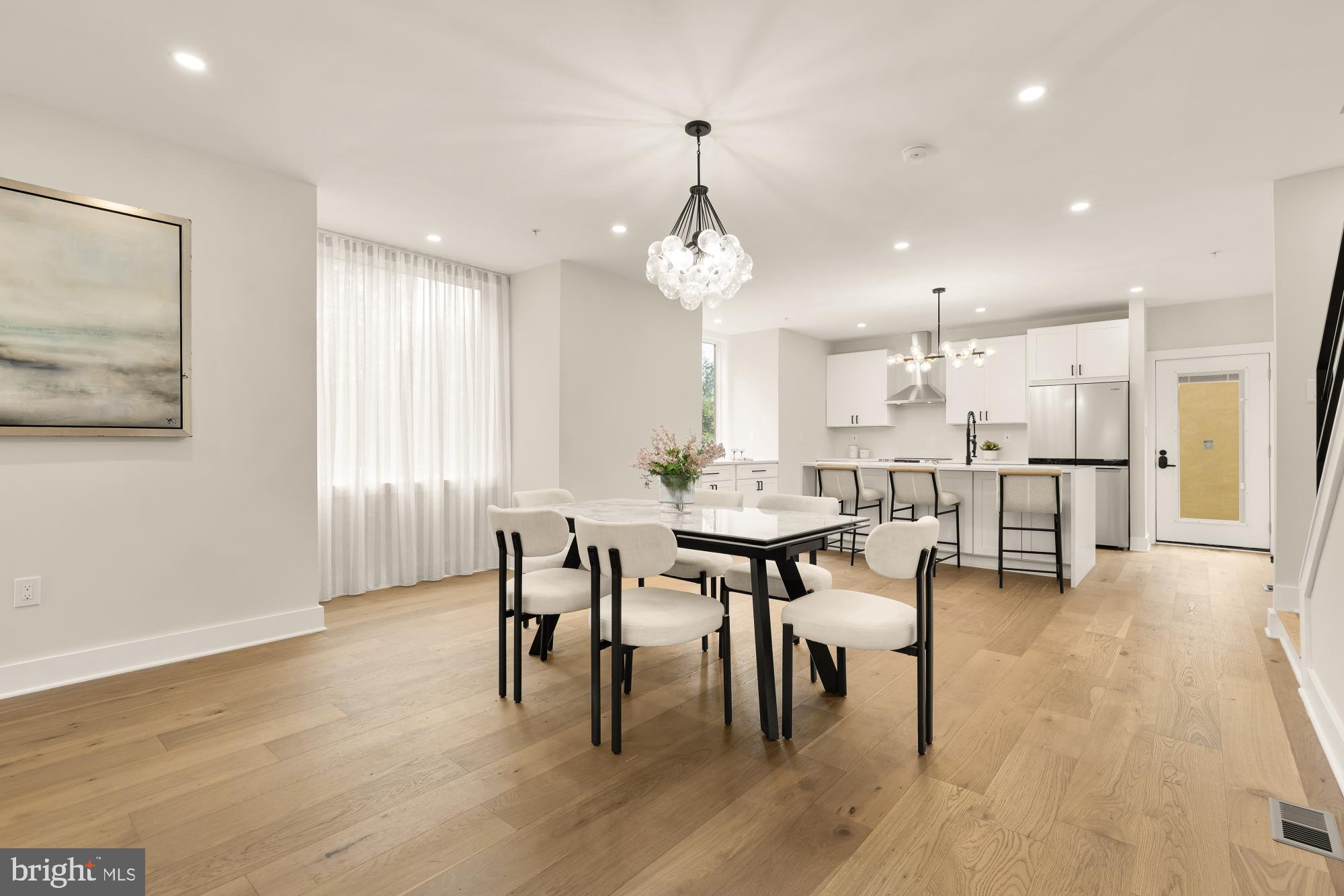 1631 G Street Southeast Washington, DC 20003 - Photo 9 of 42 a dining room with furniture and wooden floor