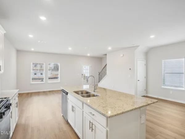 a living room with furniture and a table