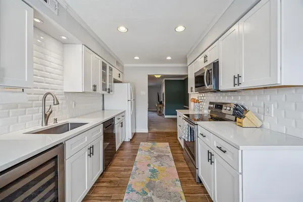 $230,000 | 10019 Regal Park Lane, Unit 207, Dallas, TX 75230