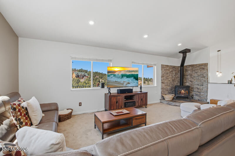 1367 Calavaras Road Reno, NV 89521 - Photo 4 of 26 a living room with furniture and a table