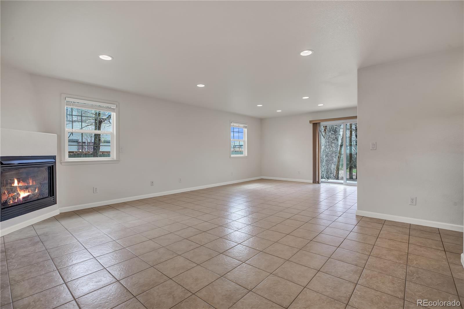 4505 Simms Court Wheat Ridge, CO 80033 - Photo 12 of 37 a view of an empty room with a window