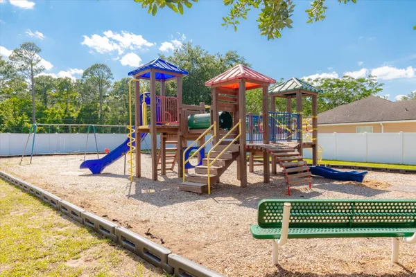 an aerial view of a house with a garden