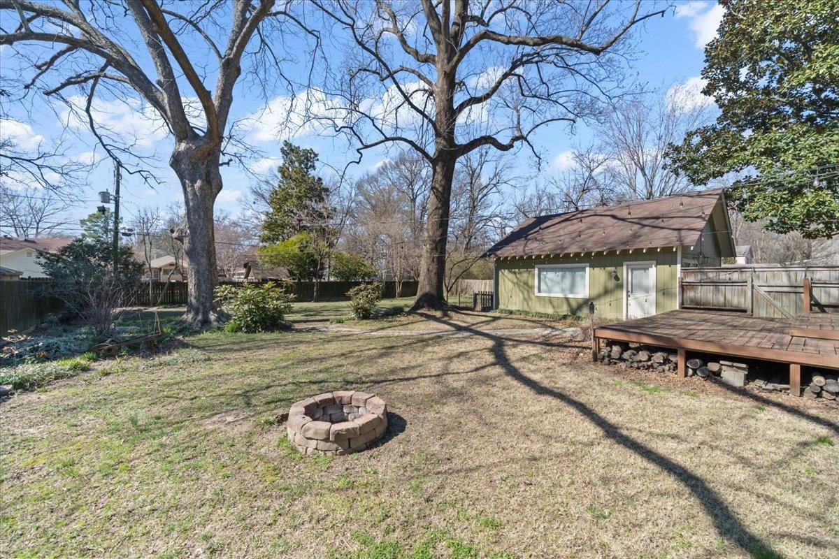 573 Alexander Street Memphis, TN 38111 - Photo 21 of 24 a view of a yard with umbrella