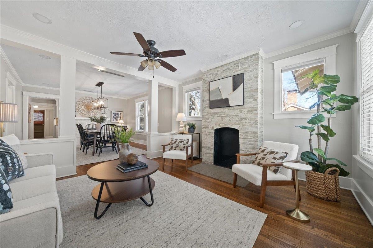 573 Alexander Street Memphis, TN 38111 - Photo 4 of 24 a living room with furniture a fireplace and a table