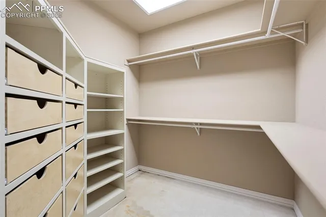 a view of an empty walk in closet