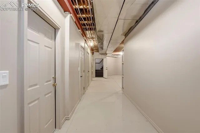 a view of hallway with stairs