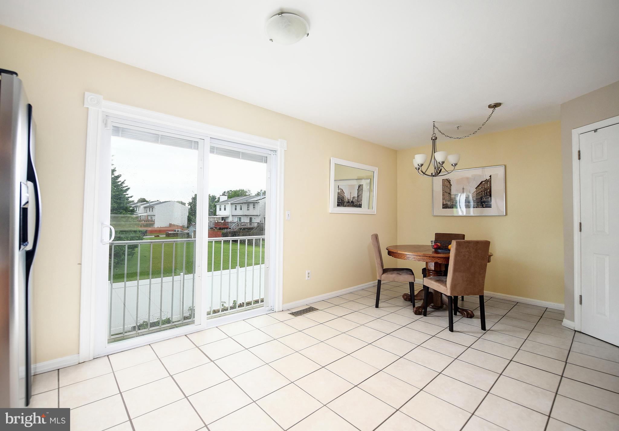 652 Hunting Fields Road Middle River, MD 21220 - Photo 12 of 32 Natural light through sliding glass door