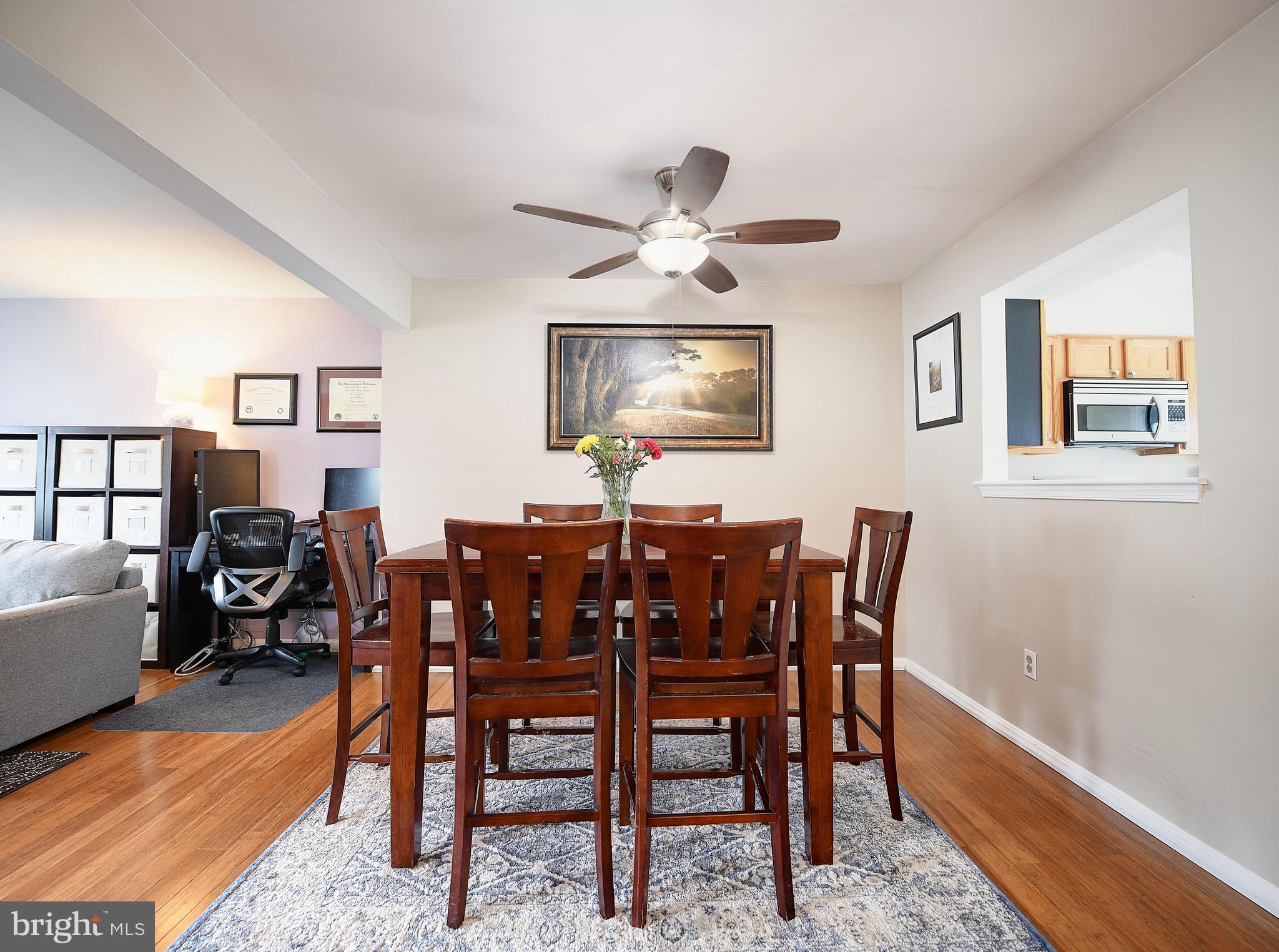 652 Hunting Fields Road Middle River, MD 21220 - Photo 15 of 32 Dining area with look through opening to kitchen