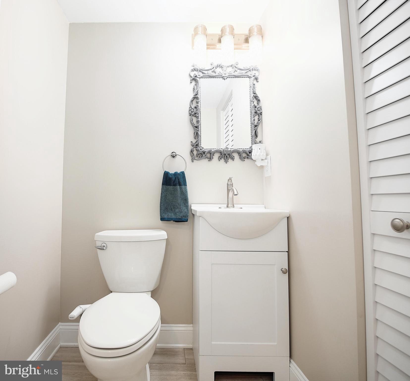 652 Hunting Fields Road Middle River, MD 21220 - Photo 9 of 32 Entry level half bath with new ceramic tile floor