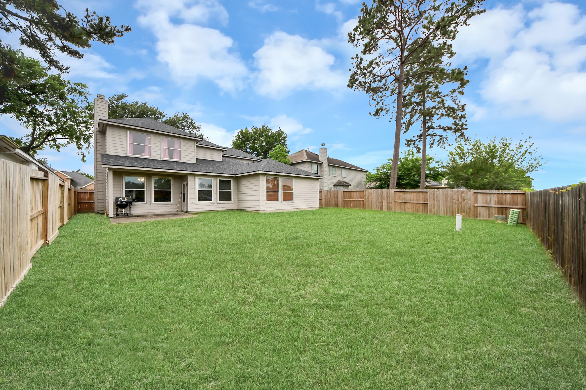 23814 Spring Dane Drive Spring, TX 77373 - Photo 6 of 41 a front view of a house with a garden