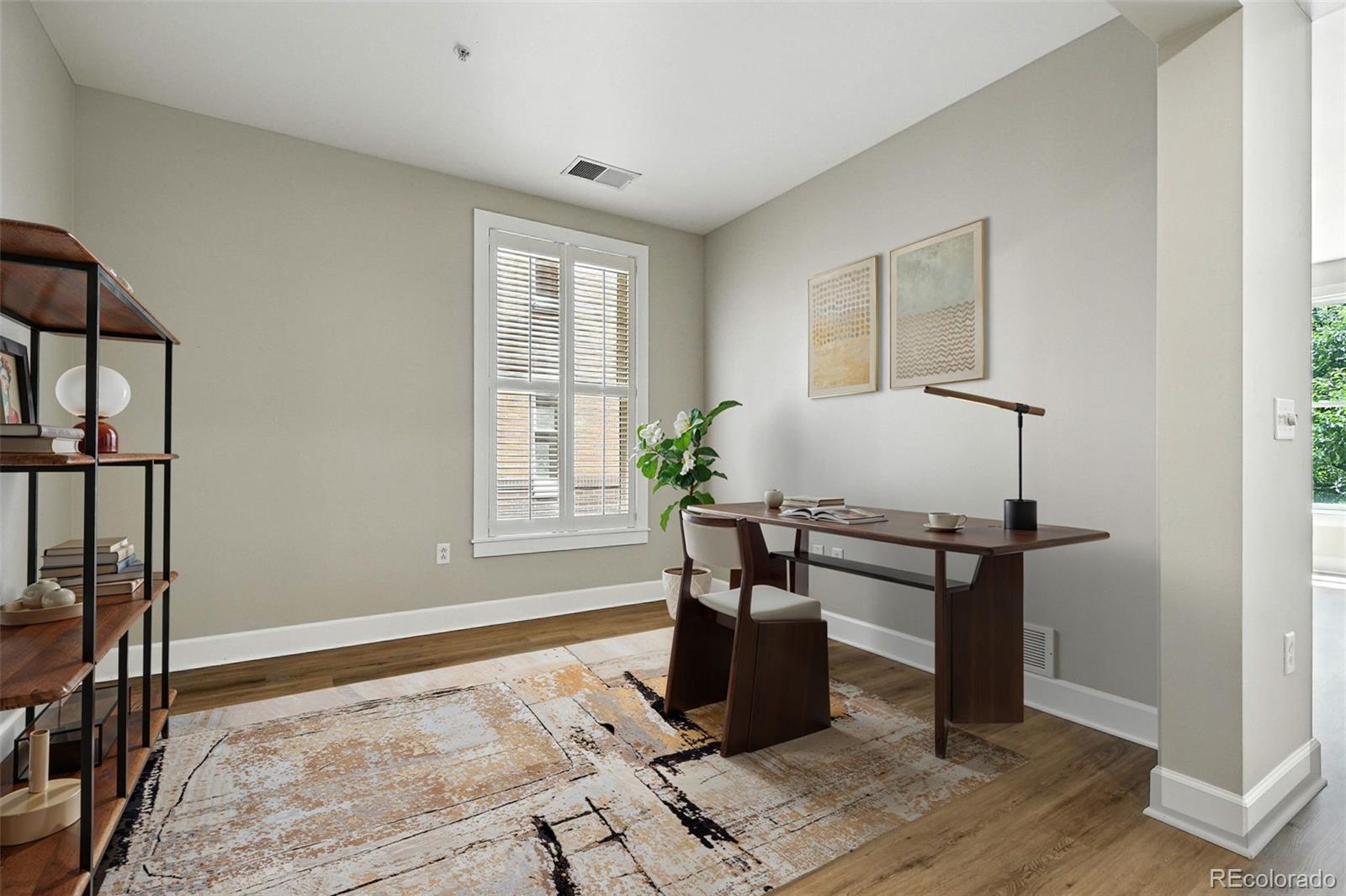 1631 Emerson Street, Unit 207 Denver, CO 80218 - Photo 19 of 30 a living room with furniture