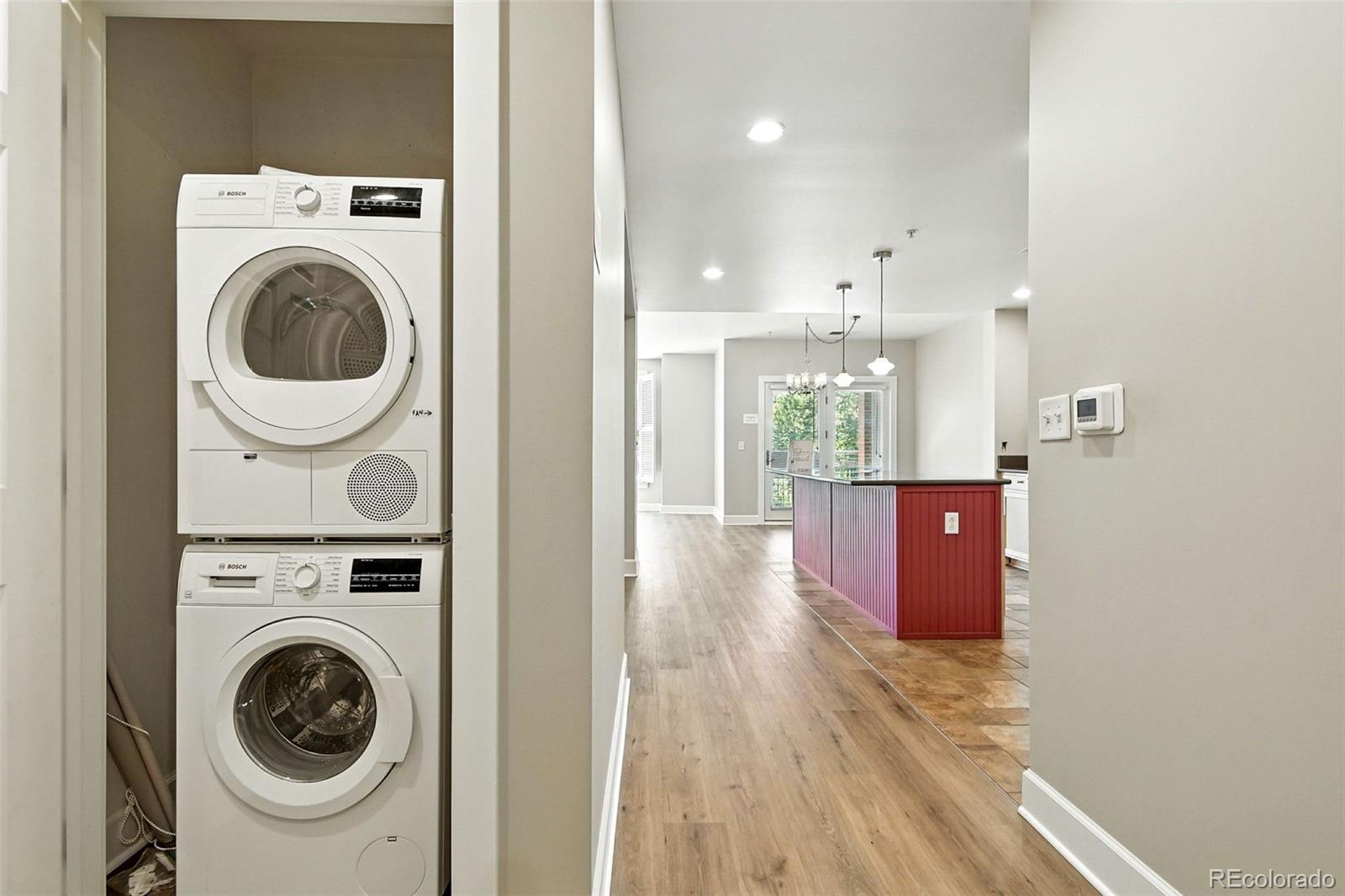 1631 Emerson Street, Unit 207 Denver, CO 80218 - Photo 25 of 31 a view of a kitchen with a washer dryer and a washer