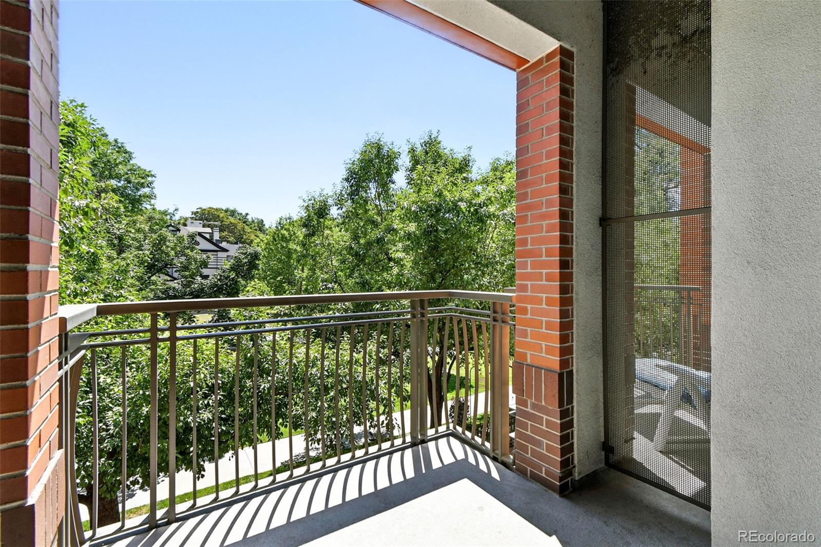 1631 Emerson Street, Unit 207 Denver, CO 80218 - Photo 26 of 31 a view of a balcony with outdoor space
