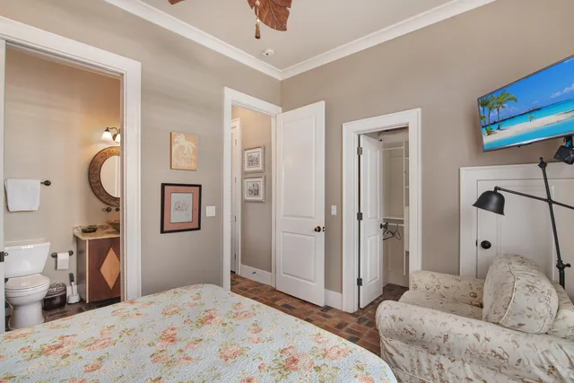 a bathroom with a sink a toilet and a shower