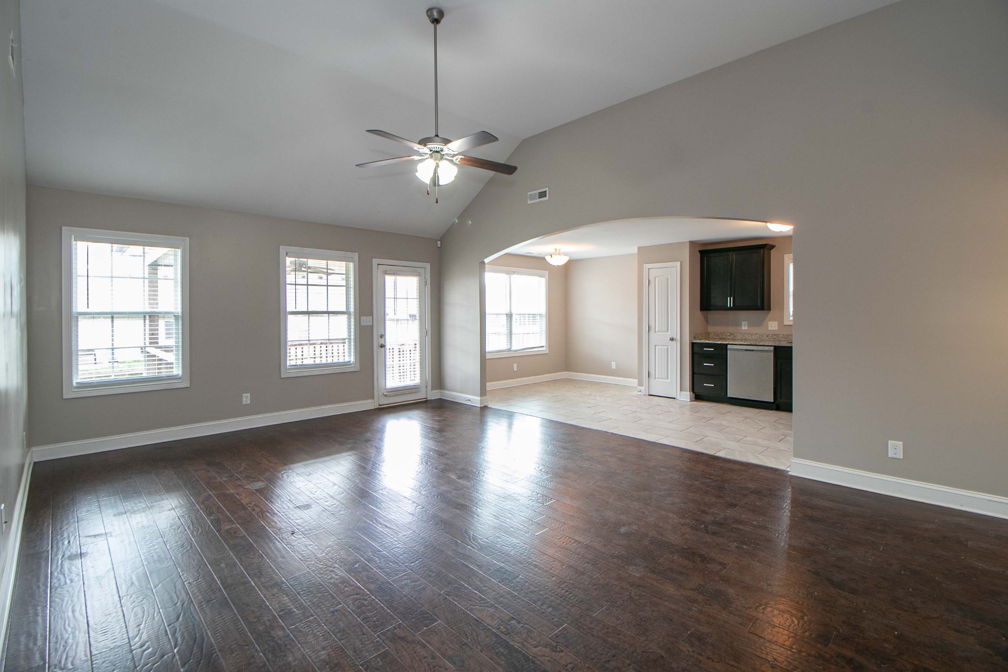 151 Ambridge Street Oak Grove, KY 42262 - Photo 4 of 30 a view of an empty room with wooden floor and a window