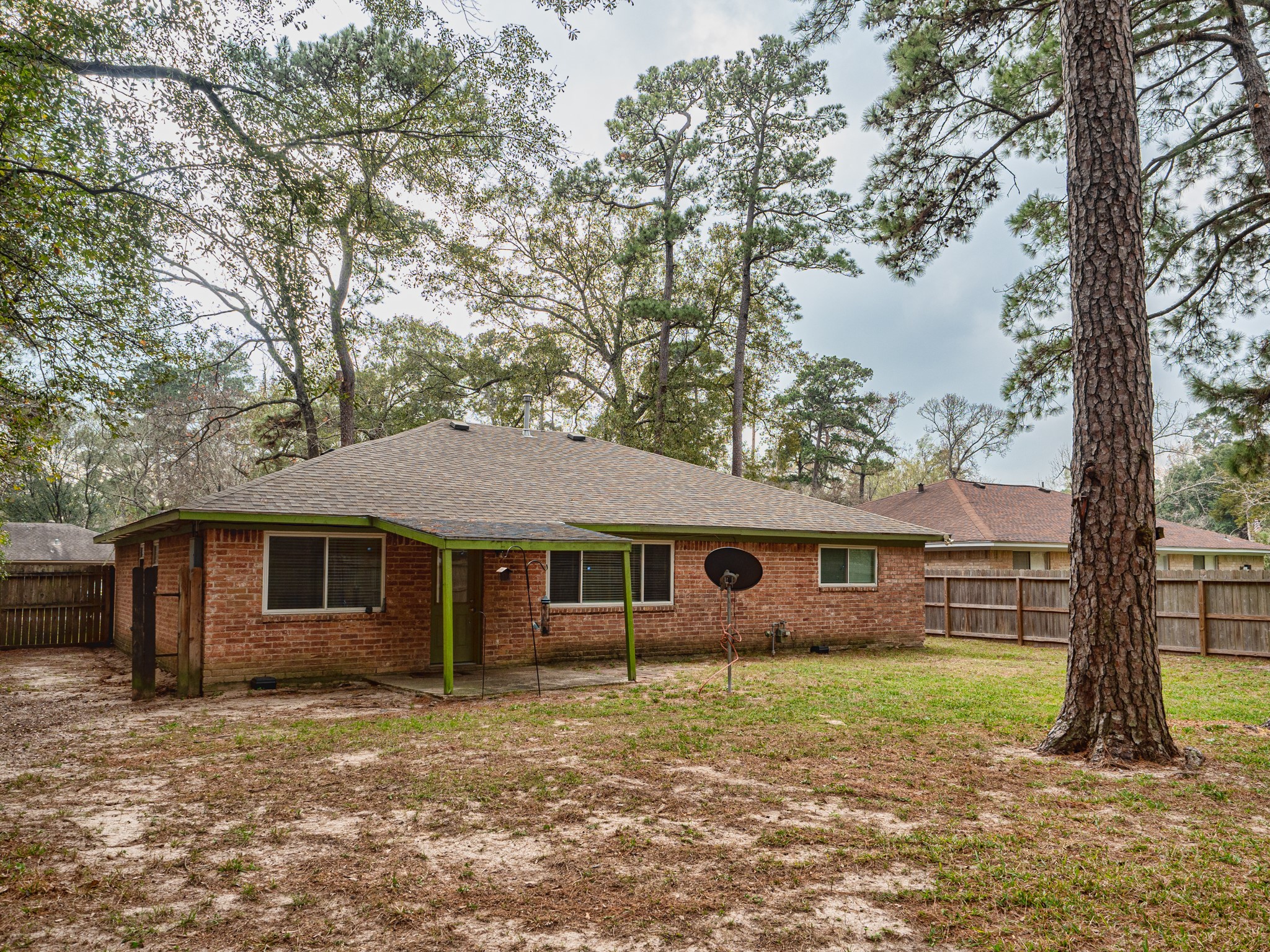 3302 Willie Way Spring, TX 77380 - Photo 22 of 25 a front view of a house with a garden