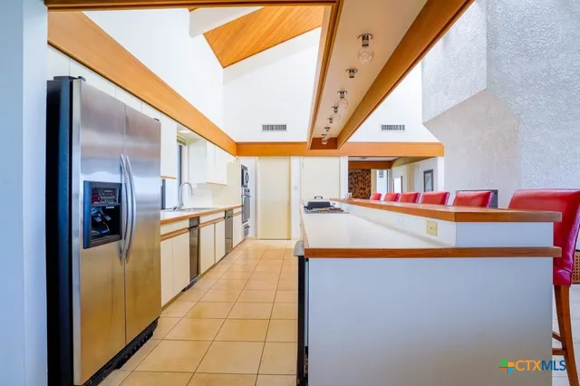 a view of a livingroom with furniture and toys