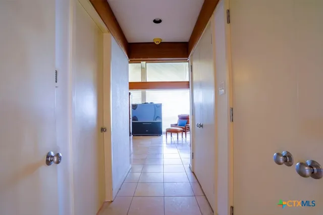 a bathroom with a sink double vanity and a mirror