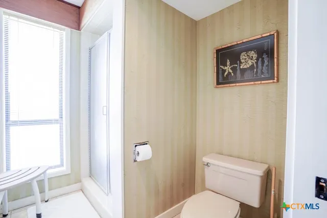 a bathroom with a bathtub and a sink