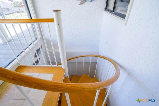 a bedroom with a bed and a table