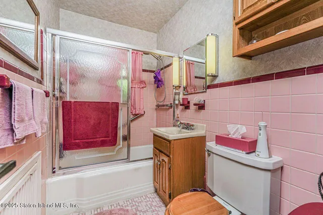 a reading room with furniture and book shelf
