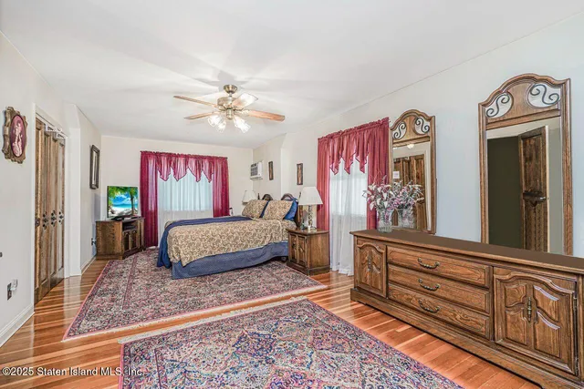 a room with lots of wooden furniture and a rug