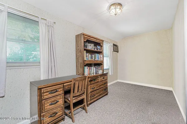 a storage room with a washer and dryer