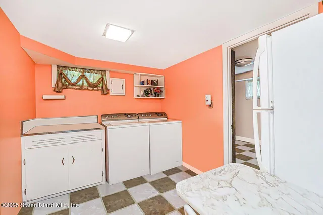 a bed room with a bed and a dresser