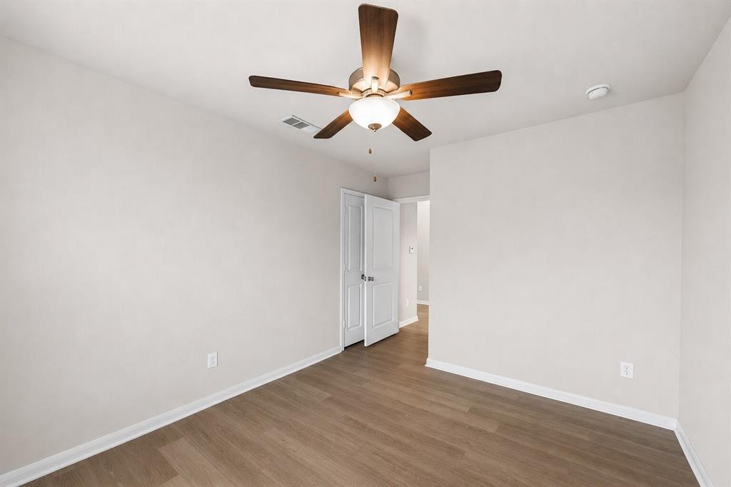 3213 Dottavio Road Lorena, TX 76655 - Photo 16 of 32 a view of empty room with wooden floor