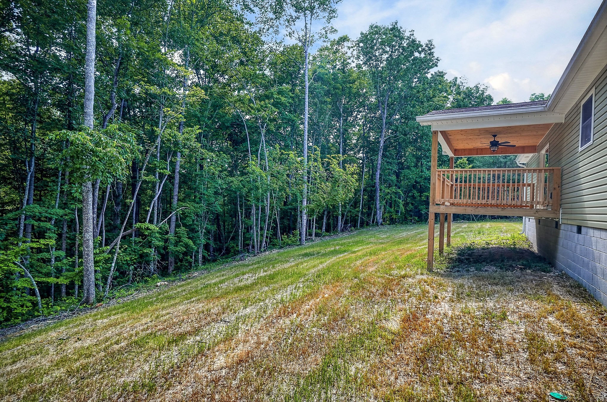 1053 Benton Tidwell Road Hilham, TN 38568 - Photo 27 of 39 a house view with a backyard space