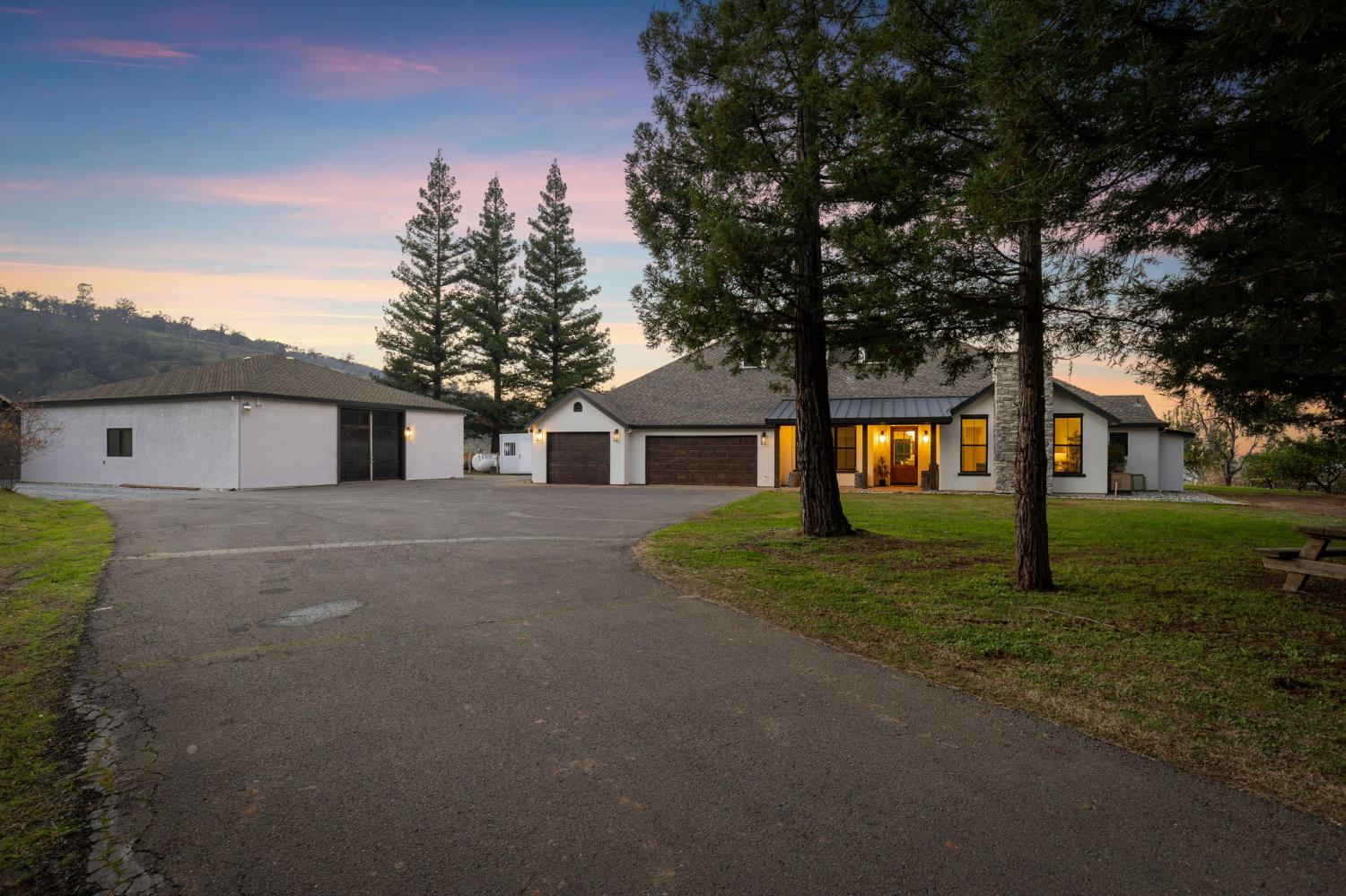 223 Spring Lane Newcastle, CA 95658 - Photo 2 of 81 a front view of a house with a yard and garage