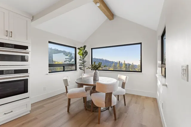 a bathroom with a sink a vanity and a mirror