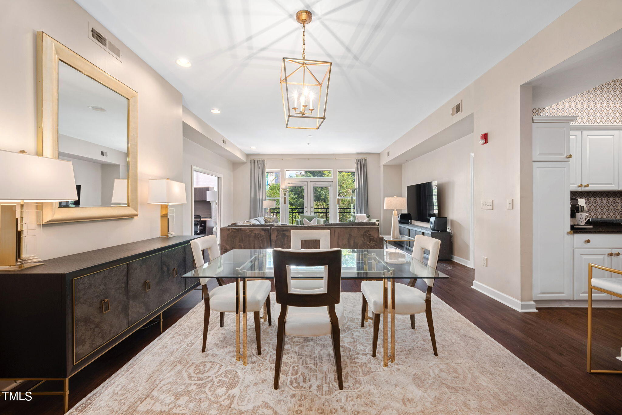 200 South Dawson Street, Unit 201 Raleigh, NC 27601 - Photo 13 of 39 a view of a dining room with furniture window and wooden floor