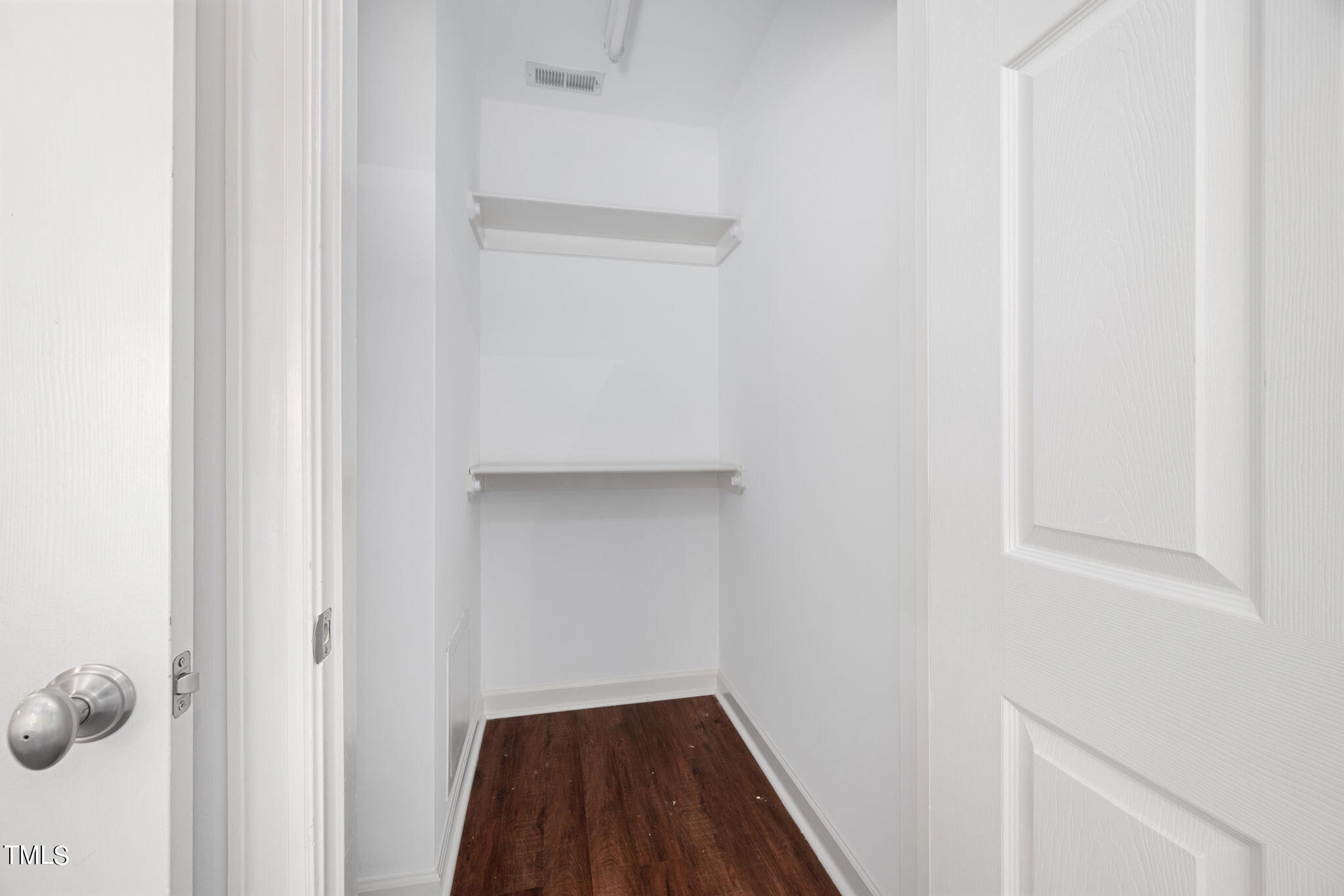 200 South Dawson Street, Unit 201 Raleigh, NC 27601 - Photo 28 of 39 a view of a hallway with racks on the wall