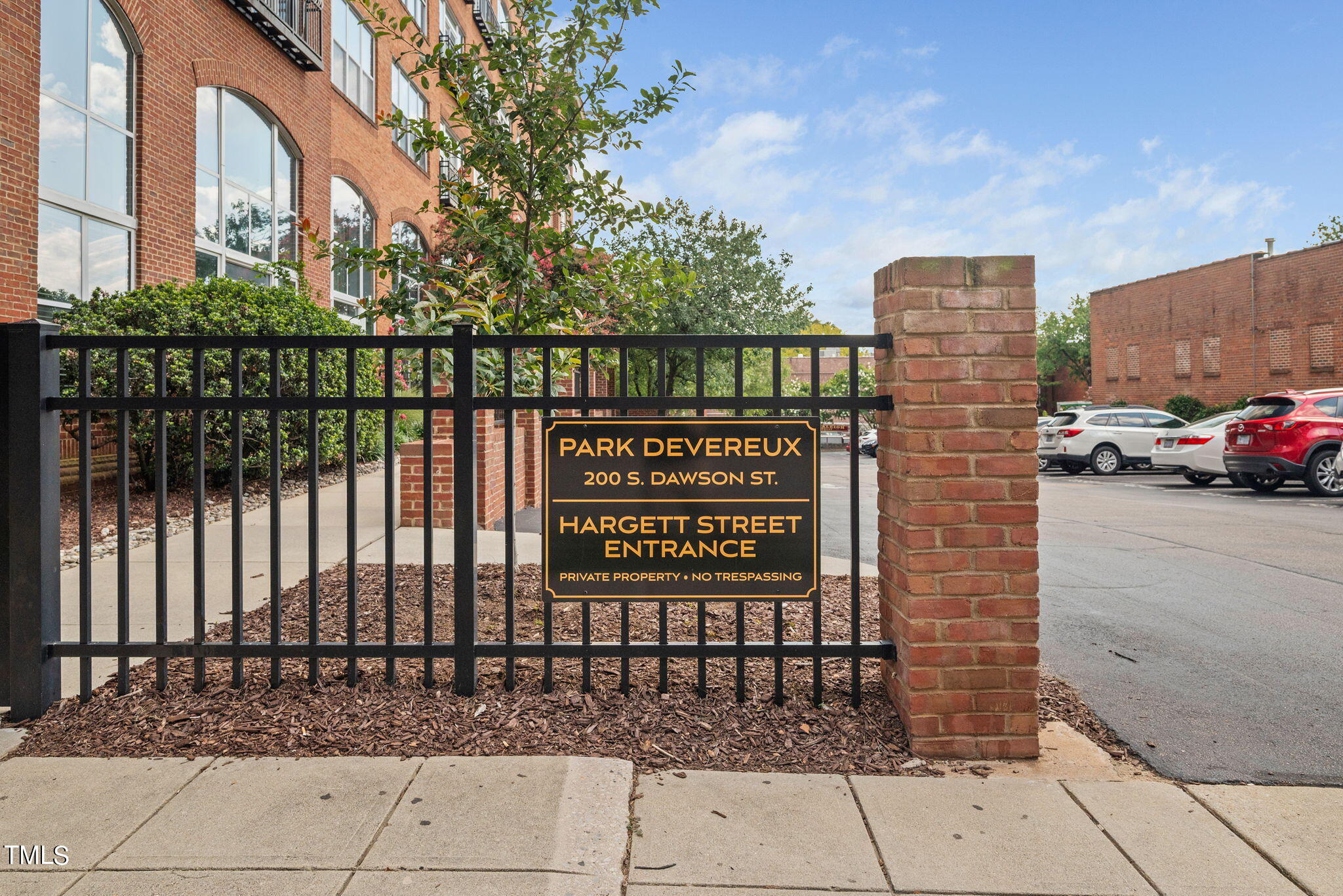 200 South Dawson Street, Unit 201 Raleigh, NC 27601 - Photo 3 of 39 a sign on the side of a building
