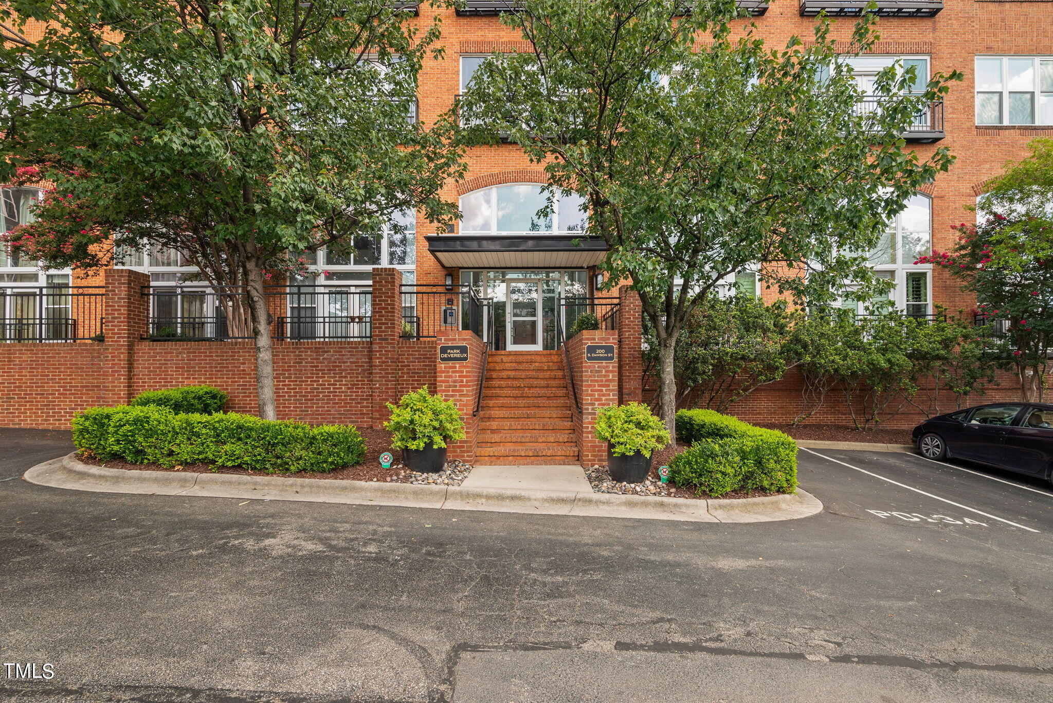 200 South Dawson Street, Unit 201 Raleigh, NC 27601 - Photo 38 of 39 front view of house with a yard