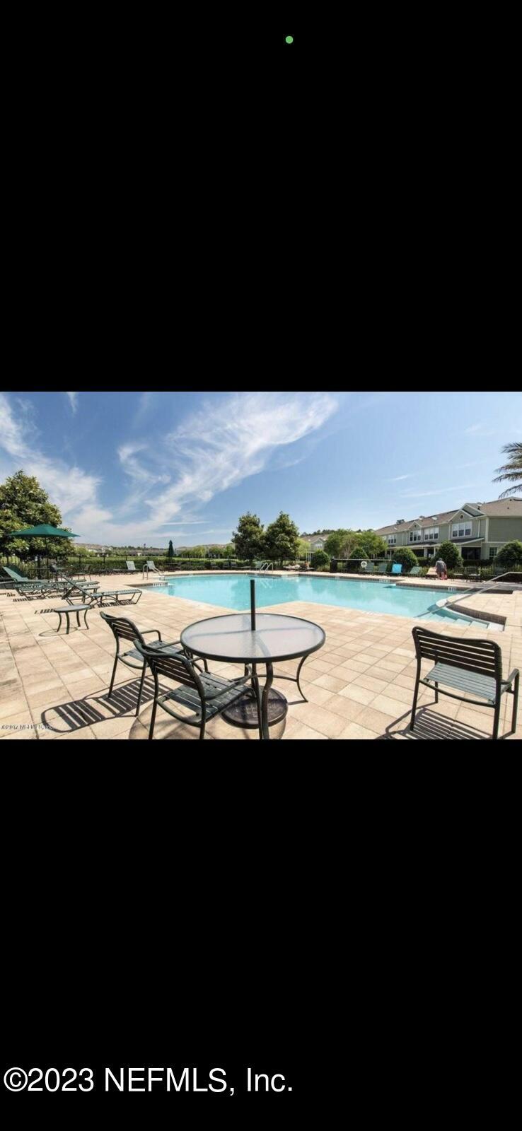 6801 Roundleaf Drive Jacksonville, FL 32258 - Photo 16 of 24 a view of a lake with outdoor space