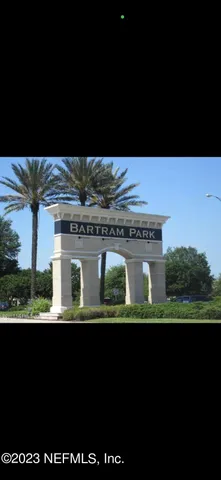 a view of balcony with furniture