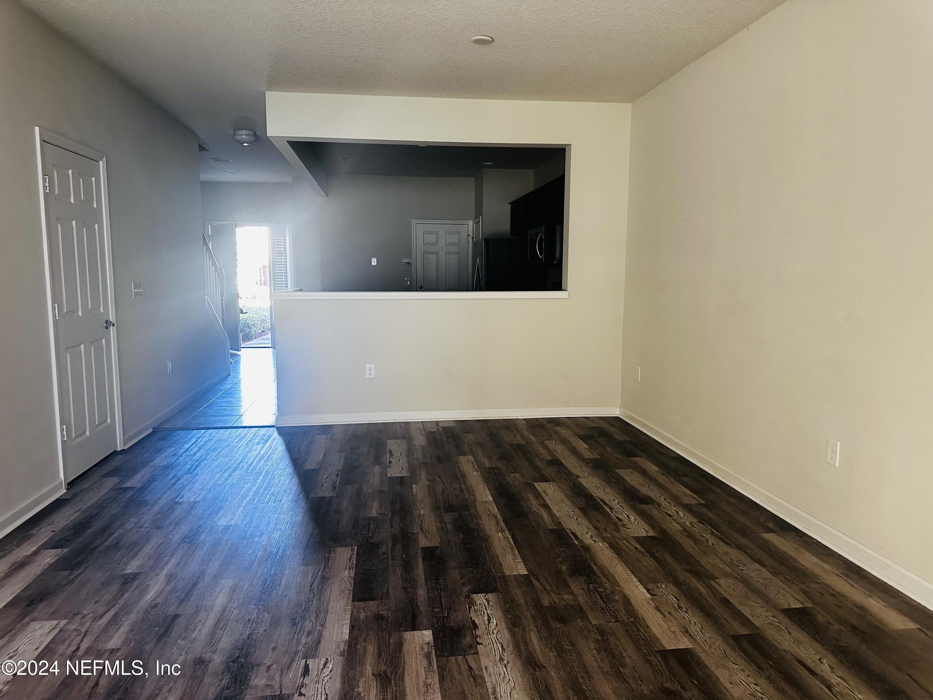 6801 Roundleaf Drive Jacksonville, FL 32258 - Photo 5 of 24 a view of wooden staircase