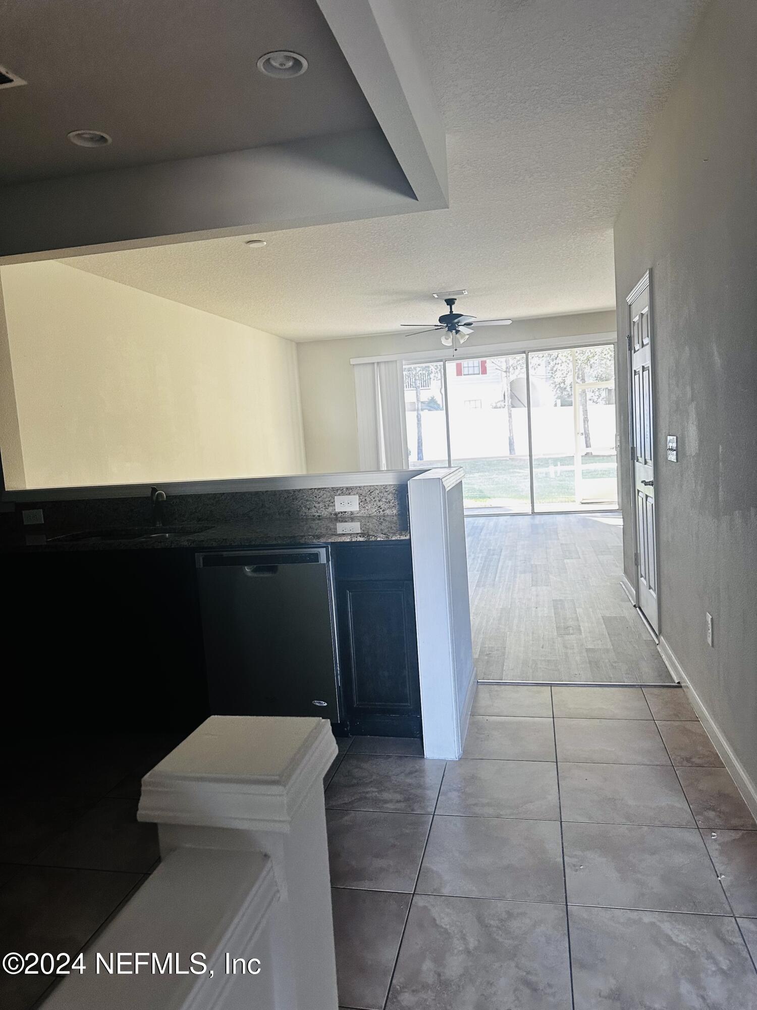 6801 Roundleaf Drive Jacksonville, FL 32258 - Photo 6 of 24 a bathroom with a sink a toilet and large mirror