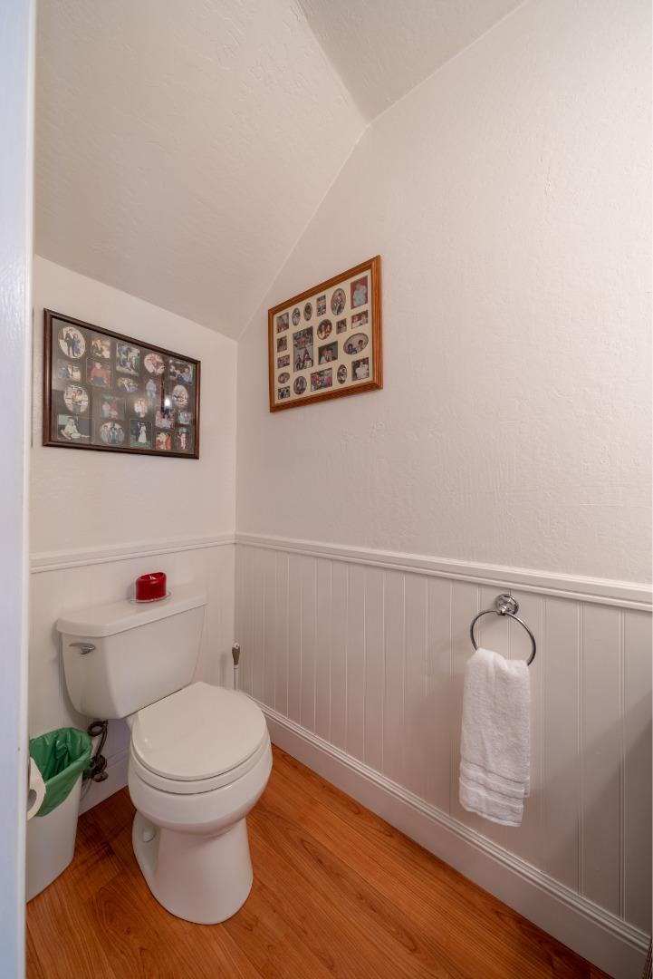 1321 Terra Nova Boulevard Pacifica, CA 94044 - Photo 19 of 39 a white toilet sitting next to a bathroom sink