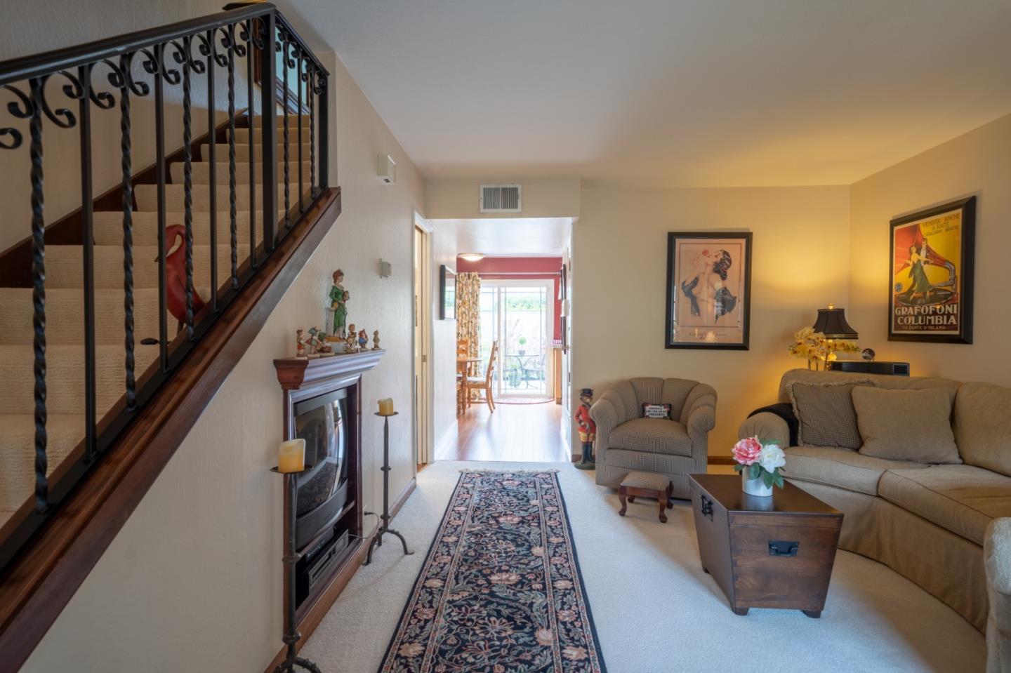 1321 Terra Nova Boulevard Pacifica, CA 94044 - Photo 25 of 39 a living room with furniture and a rug
