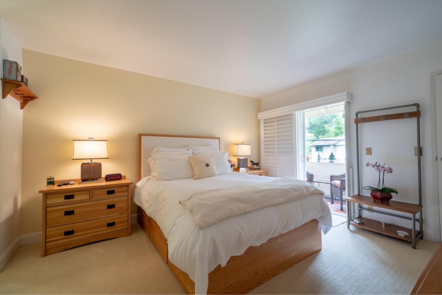 1321 Terra Nova Boulevard Pacifica, CA 94044 - Photo 29 of 39 a bedroom with a bed and a window