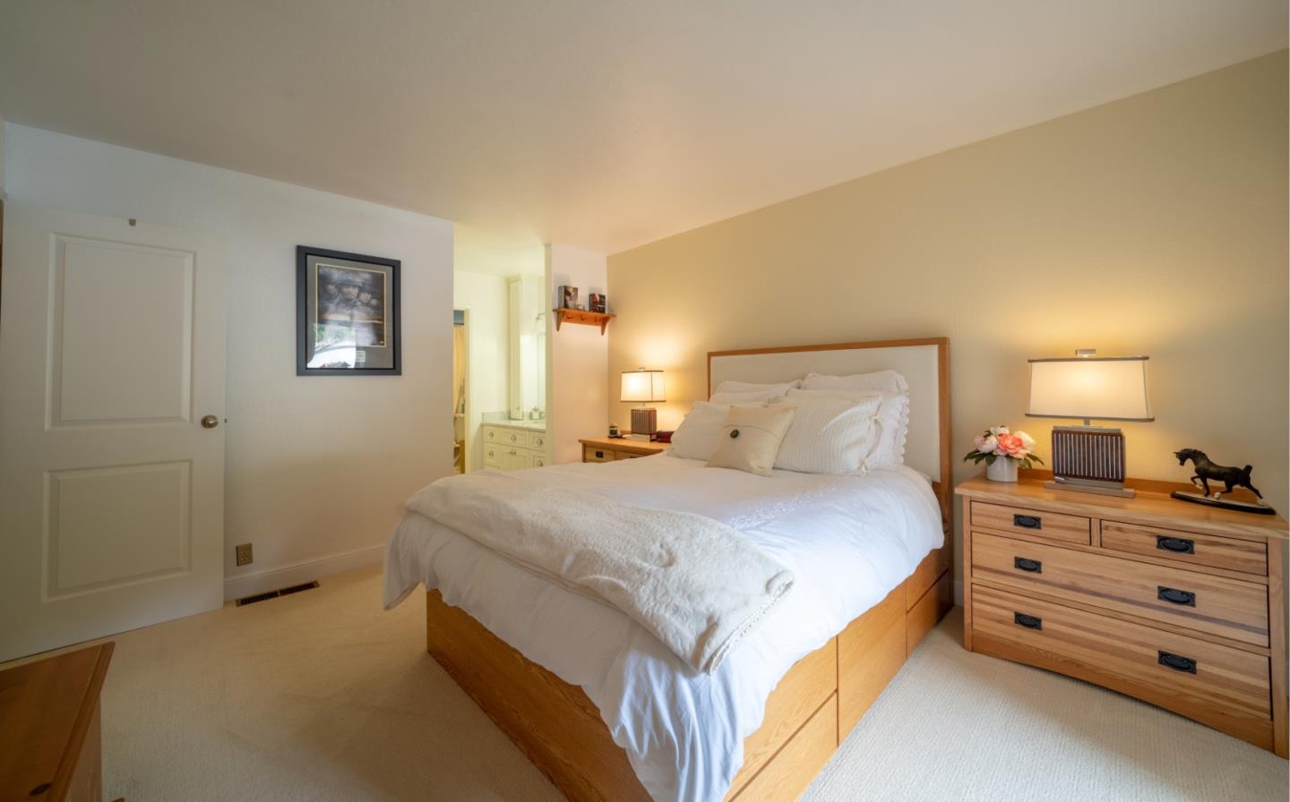 1321 Terra Nova Boulevard Pacifica, CA 94044 - Photo 30 of 39 a bedroom with a bed and a dresser