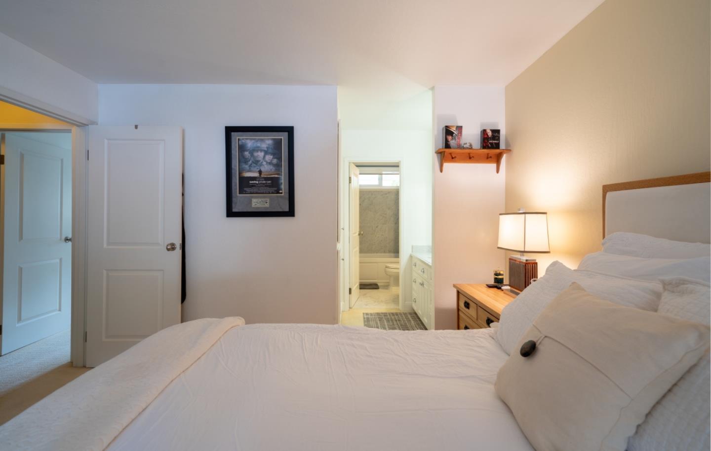 1321 Terra Nova Boulevard Pacifica, CA 94044 - Photo 32 of 39 a bedroom with a bed and a couch