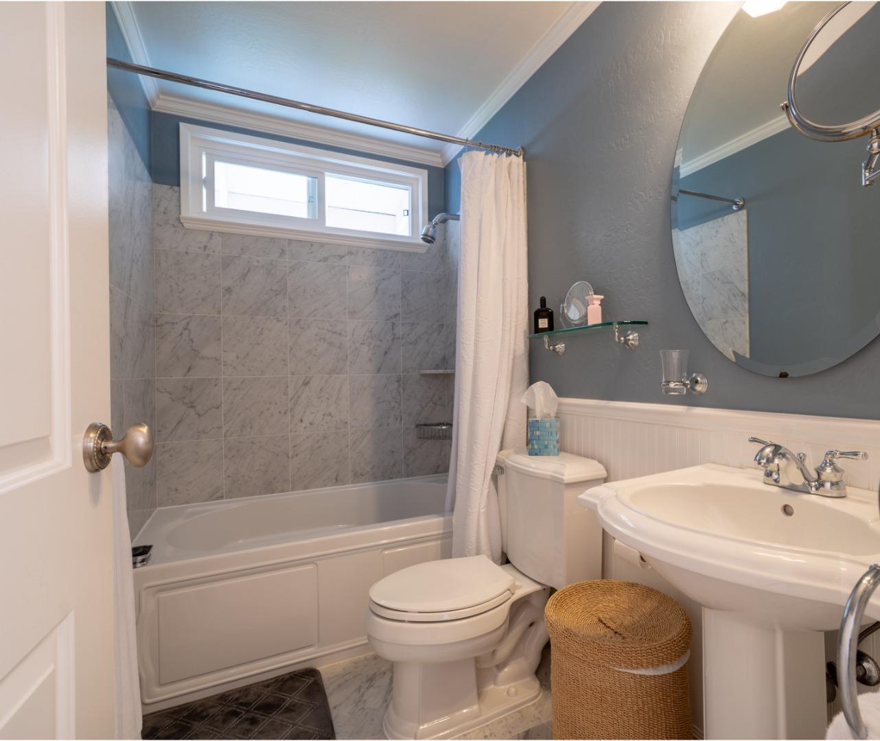 1321 Terra Nova Boulevard Pacifica, CA 94044 - Photo 36 of 39 a bathroom with a sink toilet and shower