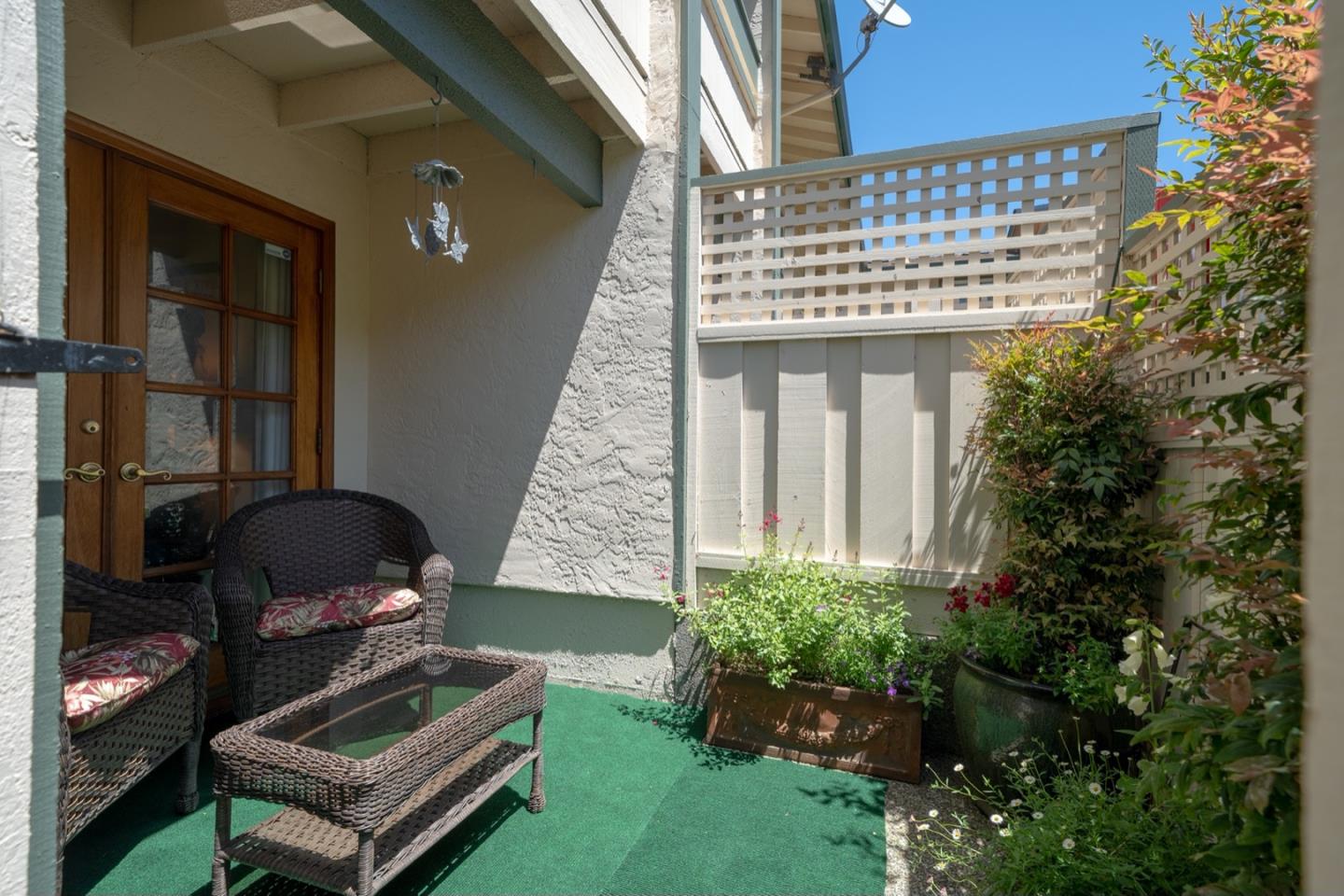1321 Terra Nova Boulevard Pacifica, CA 94044 - Photo 38 of 39 a front view of a house with a garden