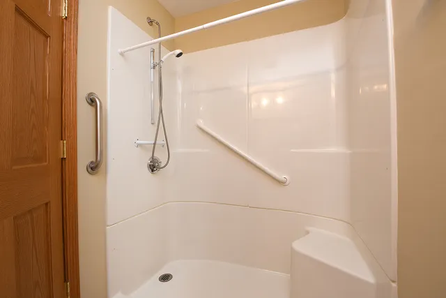 a bathroom with a bath tub