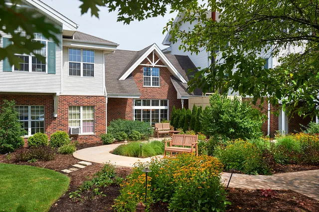 a view of a building with a yard