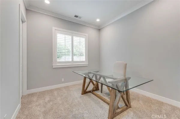 a room with furniture and a window